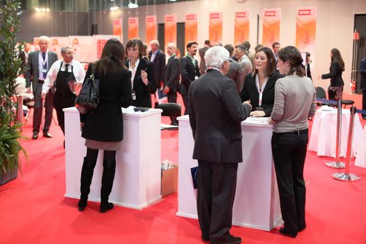 People asking for information at Smau, national fair of business intelligence and information technology October 21, 2009 in Milan, Italy.