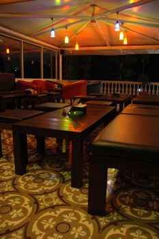 cafe interior that designed with cozzy lamp and nice sofa
