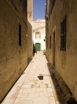 A medieval limestone paved street in Mdina on the island of Malta