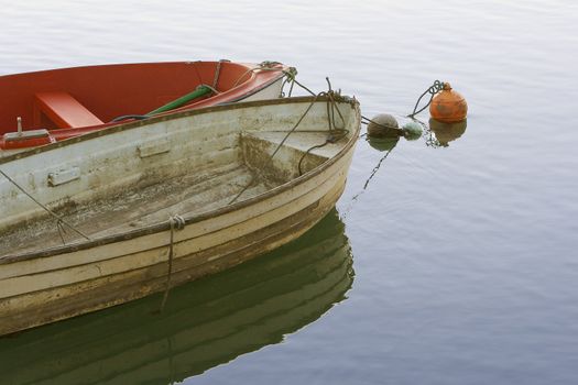 image of some boats resting in a calm sea