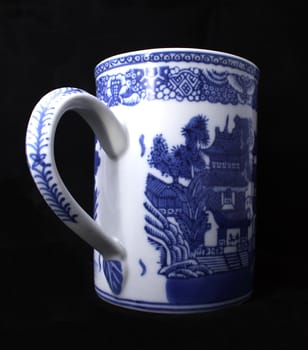 A Chinese Style Cup on black background