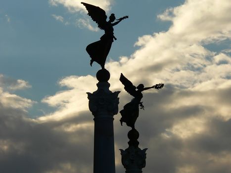 angel statue  and clouds background in rome