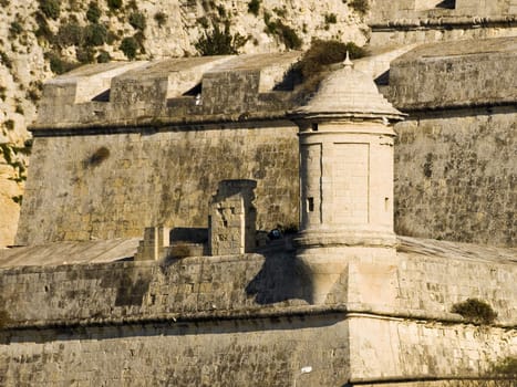 Entrance to the famous Grand Harbour in Malta, surrounded by medieval bastions and gun turrets