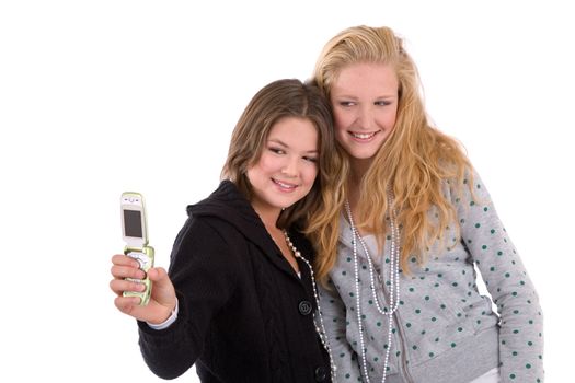 Two girlfriends taking a photo with their mobile phone