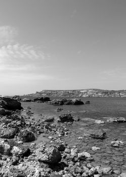 Typical rocky coastline in Malta, punctuated with sheer drops and jagged cliffs