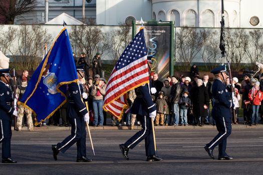LATVIA - NOVEMBER 18: USA Color Guard at Military parade of the National Armed Forces. 90th anniversary of establishment of the Republic of Latvia. Riga November 18, 2008.
