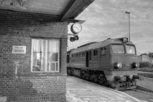 Diesel locomotive standing at the station platform
