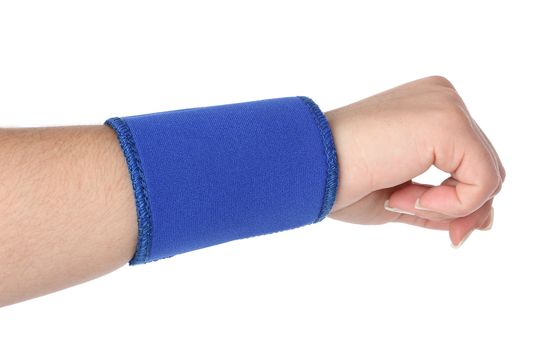 Human hand with a wrist brace, orthopeadic equipment over white