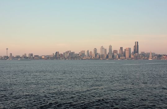 Downtown Seattle Skyline with Space Needle captured from a vantage point across the waters of the Puget Sound.