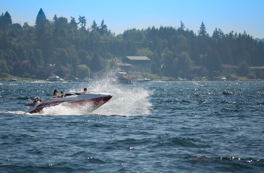 Speedboat Sprays Water and Waves on Lake Washington