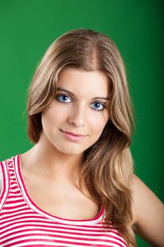 Close-up portrait of a Fresh and Beautiful young woman, isolated on green background
