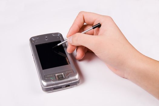 smartphone with businesswoman's hand ready to plan a meeting