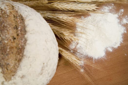 tasty and crispy fresh bread with sour and wheat head