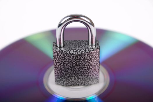 The hinged lock on compact disk removed close up