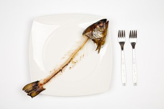 eaten fish with head and tail - symbol of misery