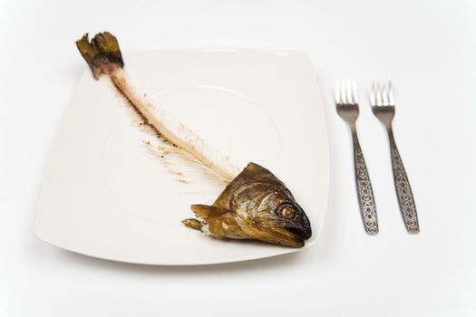 eaten fish with head and tail - symbol of misery