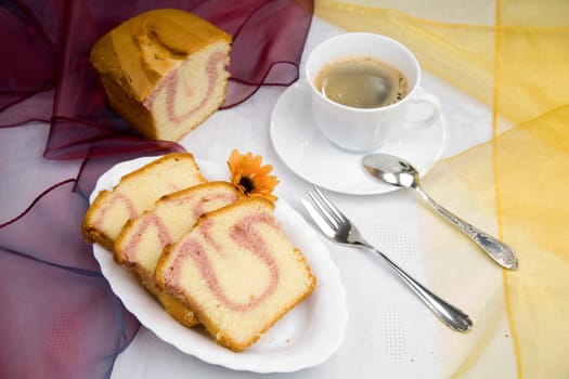 sweet cake on dish with coffee