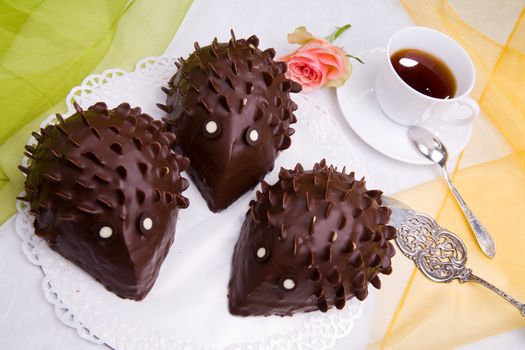 hedgehog cake with rose and coffee