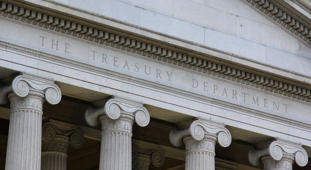 The top of the The Treasury Department building.