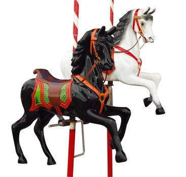 Two Merry-Go-Round Horses isolated with clipping path 
        