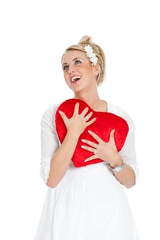 Pretty blond woman looking heavenly with a big red heart