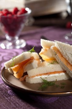 Sandwich with salmon and creamcheese stacked together