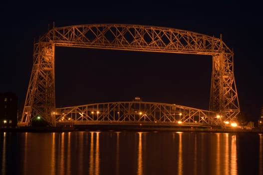 aerial lift bridge in Duluth on Lake superior at night