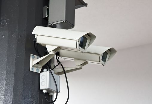 Outdoor surveillance cameras on the wall