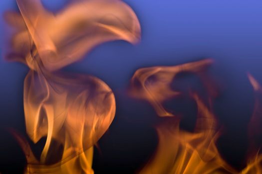 Flames of Fire Abstract on Blue Black Background 