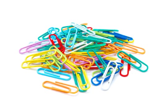 photo of the colour paperclips on white background