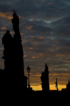 beautiful sunset at the Charles bridge in Prague