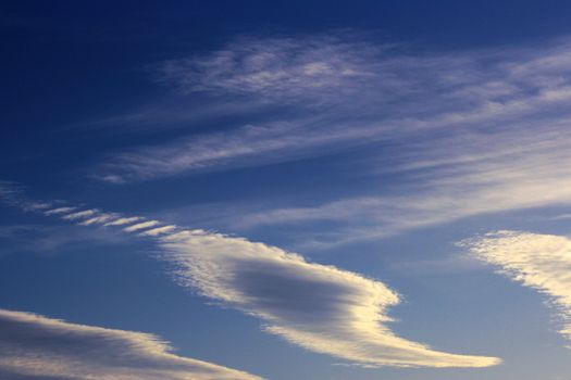 Clouds of the unusual form before a sunset.