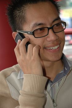 photograph of young executive trying to make a call