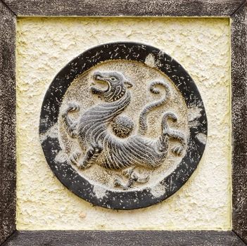 It is Chinese religious stone carving of tiger.