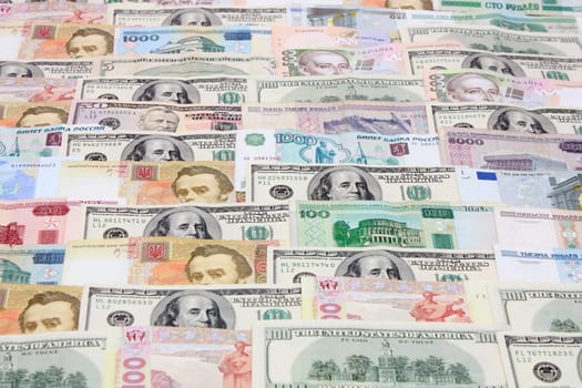 Money, various currencies as a background. Dollars, Euro, roubles