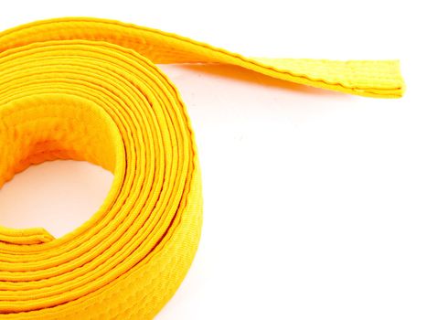 Yellow Cloth belt rolled on white background