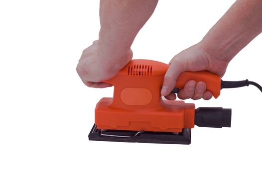 an isolated over white image of a Orange orbitol sander being held by two caucasian male hands.