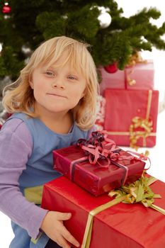 Christmas - Little girl with lots of gifts