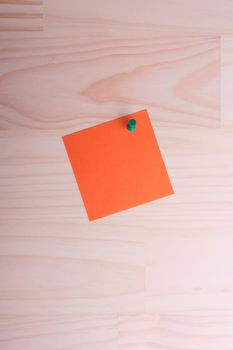 The orange standard sheet for records is pinned to the wooden panel.
