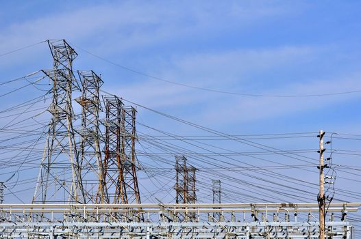 Electric towers at urban power distribution plant