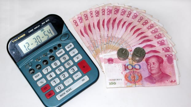 currency，money，renminbi，bill，chinese，yuan，cash，china，wealth，RMB，change，financial，hundred，Monetary，coin，calculator，