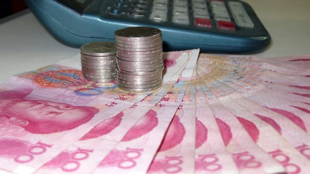 currency，money，renminbi，bill，chinese，yuan，cash，china，wealth，RMB，change，financial，hundred，Monetary，coin，calculator，