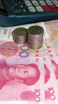 currency，money，renminbi，bill，chinese，yuan，cash，china，wealth，RMB，change，financial，hundred，Monetary，coin，calculator，