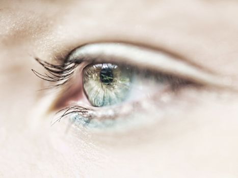 Macro of a beautiful caucasian  girl eye