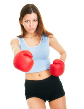Beautiful woman practicing boxing. Focus on gloves. Isolated on white