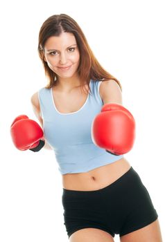 Beautiful woman practicing boxing. Isolated on white