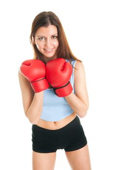 Beautiful woman practicing boxing. Isolated on white