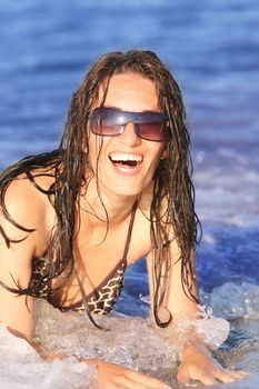 Young woman at beach in the sea