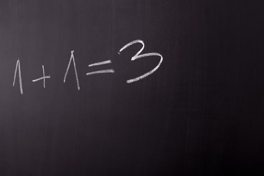 math error, in writing on blackboard in school