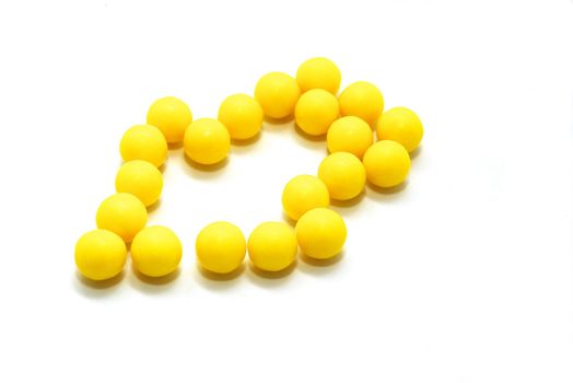photo of the vitamin pills on white background